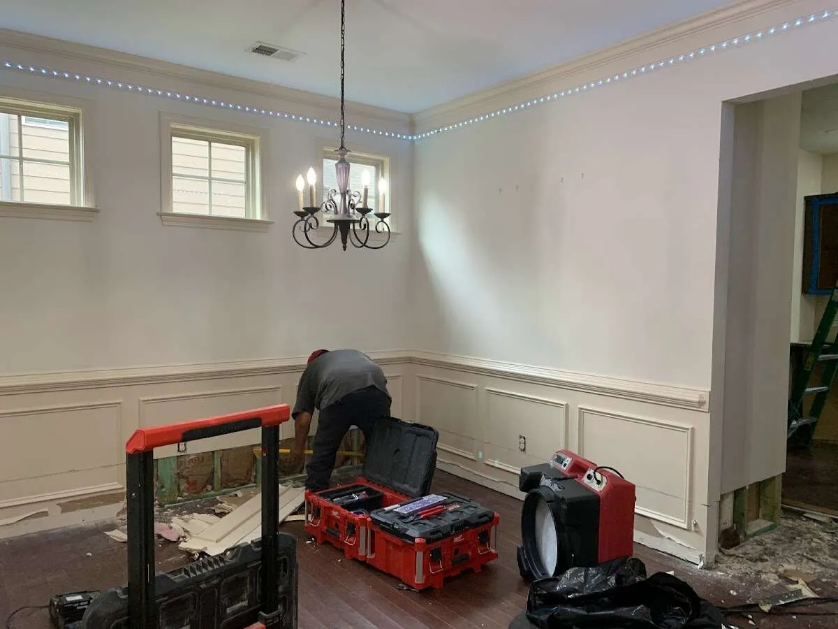 Restoration technician with professional equipment in Ossining